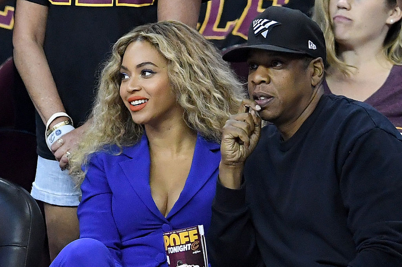 Jay Z and wife Beyoncé take in an NBA Finals game in Cleveland on June 16, 2016. Jason Miller/Getty Images